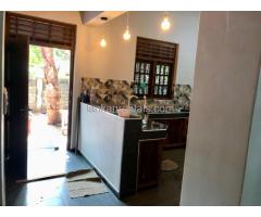 Fully tiled ground floor house for rent